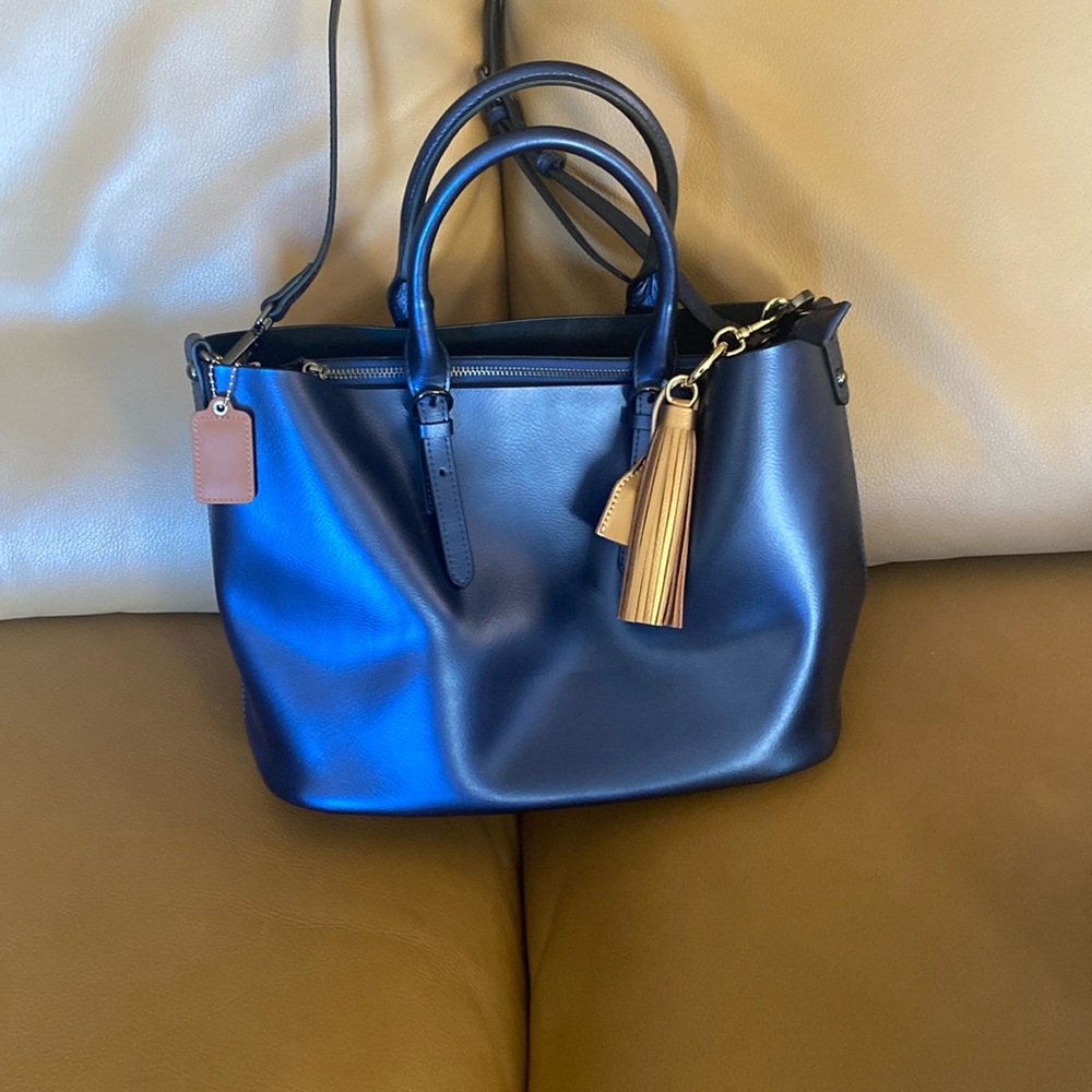 Shiny, blue leather shoulder bag. NWOT